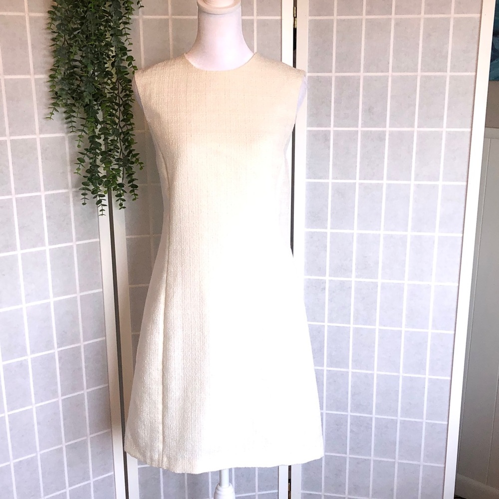H&M Classic Sleeveless Knee Length Dress in a Textured Ivory Fabric in Small.